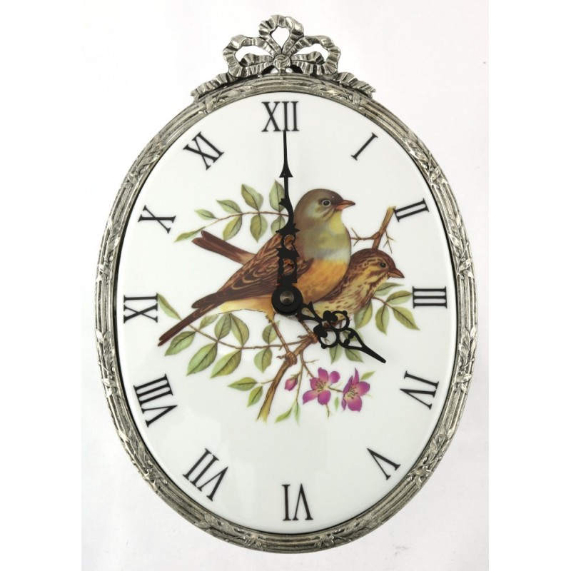 Horloge ovale décor oiseaux