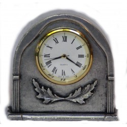 Horloge miniature en étain